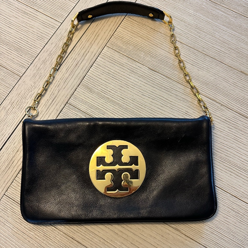 Used Tory Burch shoulder clutch.